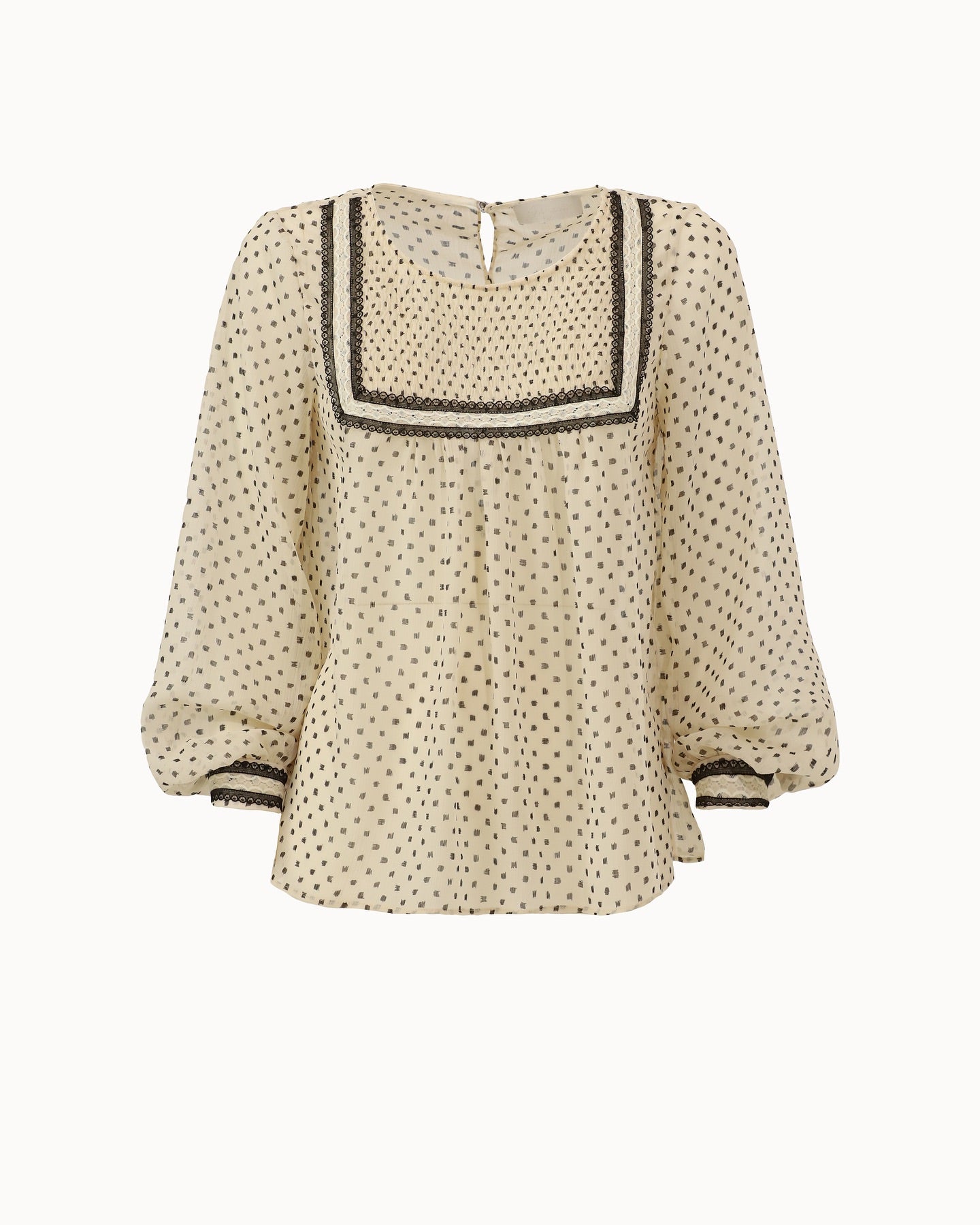 Beige blouse with dots