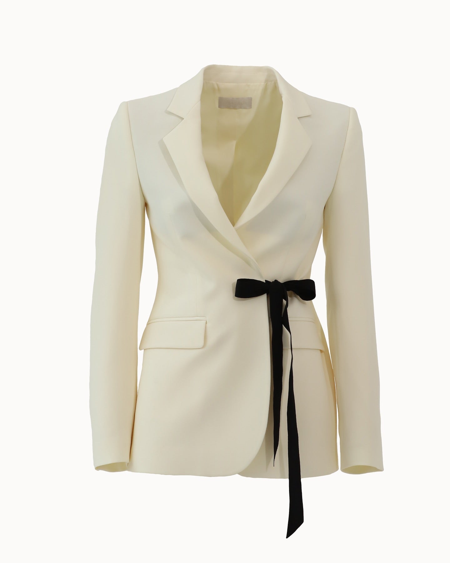 White jacket with black bow